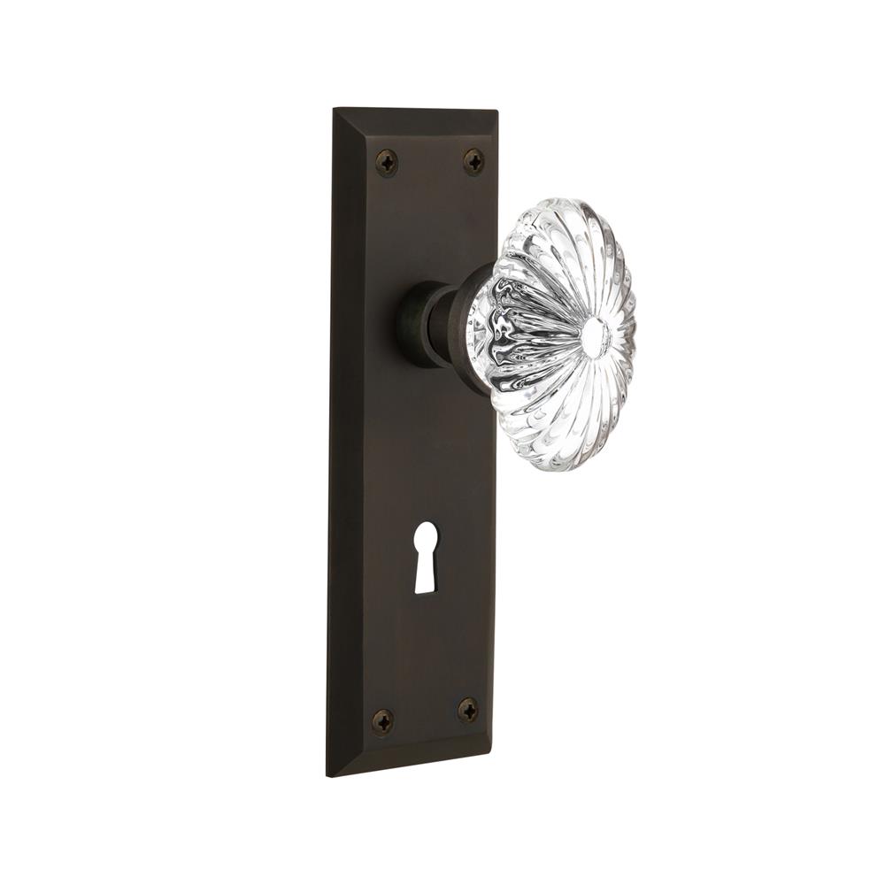 Nostalgic Warehouse NYKOFC Passage Knob New York Plate with Oval Fluted Crystal Knob with Keyhole in Oil Rubbed Bronze